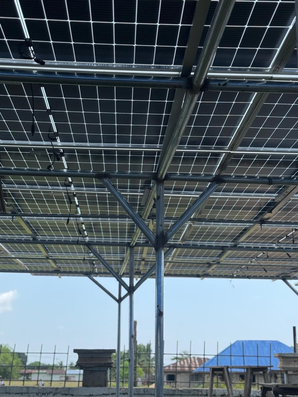 Large-scale solar panel array mounted on a steel support structure
